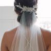 Pulled Back Half Updo Bridal Hairstyles With Comb (Photo 15 of 25)