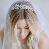 Accessorized Undone Waves Bridal Hairstyles (Photo 21 of 25)