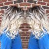 Dark Roots And Icy Cool Ends Blonde Hairstyles (Photo 23 of 25)
