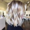Curly Caramel Blonde Bob Hairstyles (Photo 7 of 25)