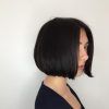 Jaw-Length Inverted Curly Brunette Bob Hairstyles (Photo 7 of 25)