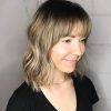 Medium Length Haircuts With Arched Bangs (Photo 12 of 25)