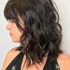 Feathered Haircuts With Angled Bangs (Photo 7 of 25)