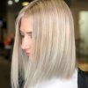 Blonde Textured Haircuts With Angled Layers (Photo 17 of 25)