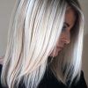 Dark Roots And Icy Cool Ends Blonde Hairstyles (Photo 6 of 25)
