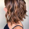 Medium Hairstyles With Perky Feathery Layers (Photo 24 of 25)