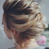 Side Bun Twined Prom Hairstyles With A Braid (Photo 8 of 25)