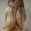 Twisted And Pinned Half Up Wedding Hairstyles (Photo 3 of 25)