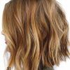 Mid-Back Brown U-Shaped Haircuts With Swoopy Layers (Photo 18 of 25)
