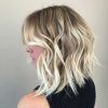 Icy Waves And Angled Blonde Hairstyles (Photo 13 of 25)