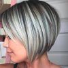 Blonde Textured Haircuts With Angled Layers (Photo 12 of 25)
