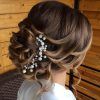Sleek Bridal Hairstyles With Floral Barrette (Photo 18 of 25)