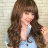 Feathered Bangs Hairstyles With Bright Highlights (Photo 24 of 25)