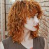 Asymmetrical Parting Feathered Fringe Hairstyles (Photo 13 of 25)
