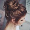 Large Bun Wedding Hairstyles With Messy Curls (Photo 6 of 25)