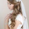 Half Up Wedding Hairstyles With Jeweled Clip (Photo 4 of 25)