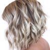 Curly Angled Blonde Bob Hairstyles (Photo 11 of 25)