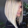 Striking Angled Platinum Lob Blonde Hairstyles (Photo 1 of 25)