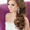 Sophisticated Pulled Back Cascade Bridal Hairstyles (Photo 14 of 25)