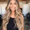 Creamy Blonde Waves With Bangs (Photo 16 of 25)