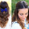 Thin Double Braids With Bold Bow (Photo 1 of 15)