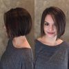 Jaw-Length Inverted Curly Brunette Bob Hairstyles (Photo 16 of 25)