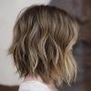 Sun-Kissed Blonde Hairstyles With Sweeping Layers (Photo 4 of 25)