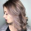 Soft Waves Blonde Hairstyles With Platinum Tips (Photo 25 of 25)