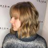 Short Bob Hairstyles With Whipped Curls And Babylights (Photo 24 of 25)