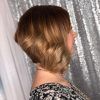 Curly Angled Bob Hairstyles (Photo 12 of 25)