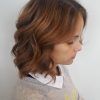 Nape-Length Brown Bob Hairstyles With Messy Curls (Photo 19 of 25)