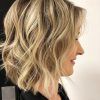 Angled Brunette Bob Hairstyles With Messy Curls (Photo 24 of 25)
