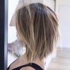 Blonde Textured Haircuts With Angled Layers (Photo 23 of 25)
