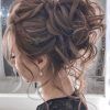 Elegant Messy Updo Hairstyles On Curly Hair (Photo 18 of 25)