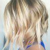 Honey Hued Beach Waves Blonde Hairstyles (Photo 21 of 25)