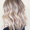 Pearl Blonde Bouncy Waves Hairstyles (Photo 5 of 25)