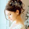 Bridal Mid-Bun Hairstyles With A Bouffant (Photo 21 of 25)