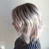 Pearl Blonde Bouncy Waves Hairstyles (Photo 18 of 25)