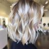 Two-Tier Caramel Blonde Lob Hairstyles (Photo 20 of 25)