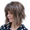 Layered Pixie Hairstyles With Textured Bangs (Photo 11 of 25)