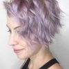 Voluminous Platinum And Purple Curls Blonde Hairstyles (Photo 21 of 25)