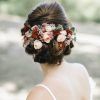 Undone Low Bun Bridal Hairstyles With Floral Headband (Photo 13 of 25)