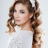 Curly Wedding Hairstyles With An Orchid (Photo 24 of 25)