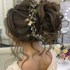 Large Bun Wedding Hairstyles With Messy Curls (Photo 19 of 25)