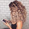 Playful Blonde Curls Hairstyles (Photo 25 of 25)