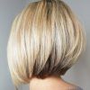 Dynamic Tousled Blonde Bob Hairstyles With Dark Underlayer (Photo 24 of 25)