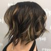 Angled Brunette Bob Hairstyles With Messy Curls (Photo 9 of 25)