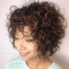 Black Wet Curly Bob Hairstyles With Subtle Highlights (Photo 4 of 25)