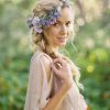 Bohemian Curls Bridal Hairstyles With Floral Clip (Photo 25 of 25)
