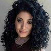 Layered Curly Medium Length Hairstyles (Photo 19 of 25)